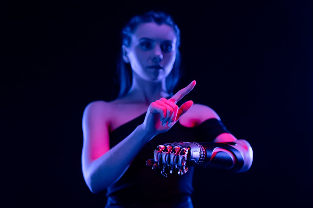 Conceptual photo of a woman using a prosthetic arm, showcasing cutting-edge biotechnology.